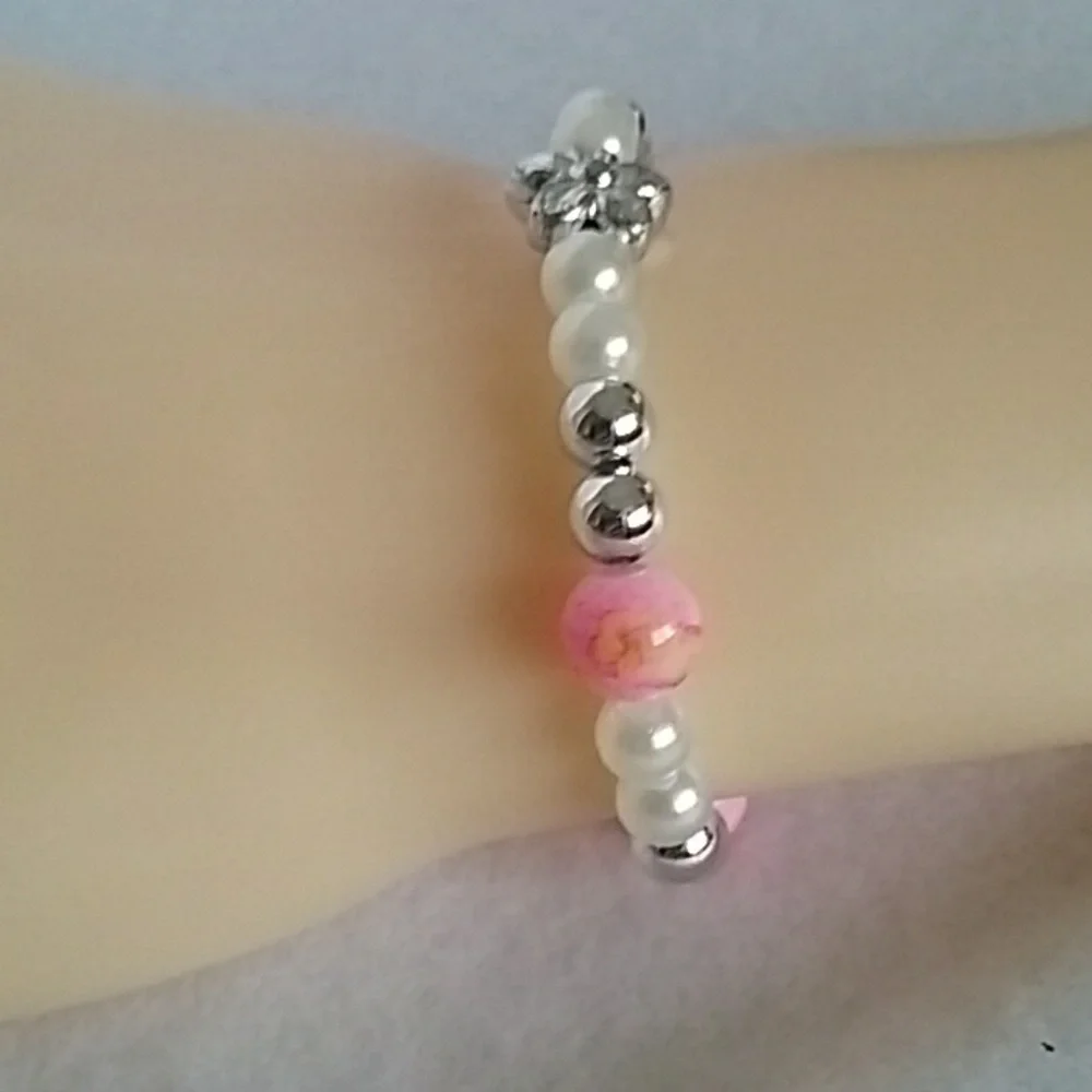 Girls floral and pink beaded bracelet